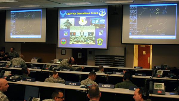 Airmen of the New York Air National Guard’s 152nd Air Operations Group man their stations during Virtual Flag, a computer wargame held Feb. 18-26 from Hancock Field Air National Guard Base. The computer hookup allowed the air war planners of the 152nd to interact with other Air Force units around the country and in Europe. U.S. Air National Guard photo by Master Sgt. Eric Miller